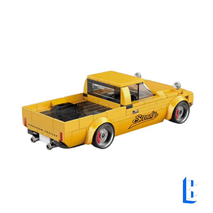 Le pick-up jaune (vitrine inclus)