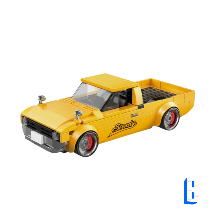 Le pick-up jaune (vitrine inclus)