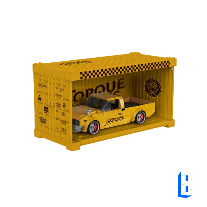 Le pick-up jaune (vitrine inclus)