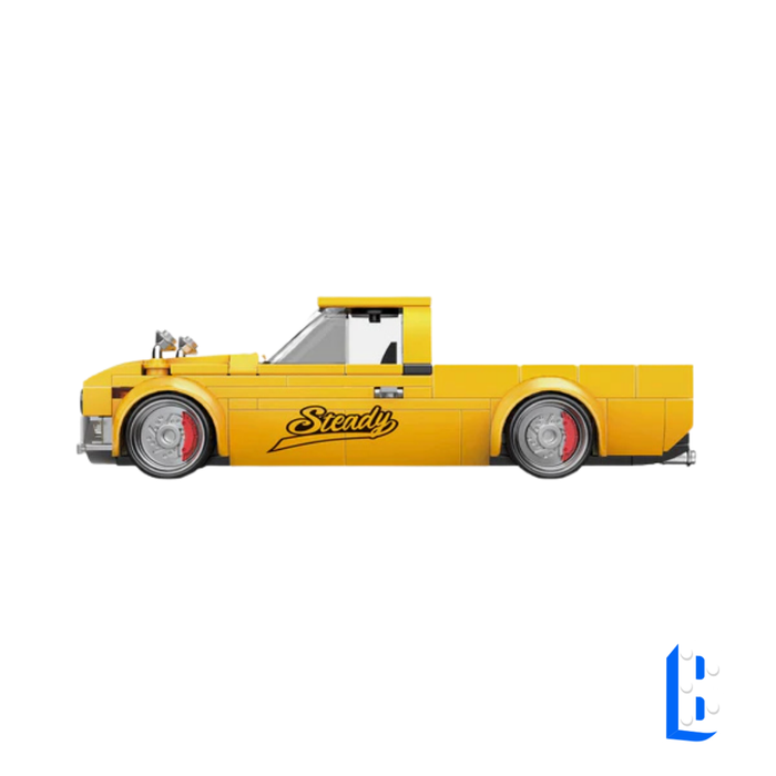 Le pick-up jaune (vitrine inclus)